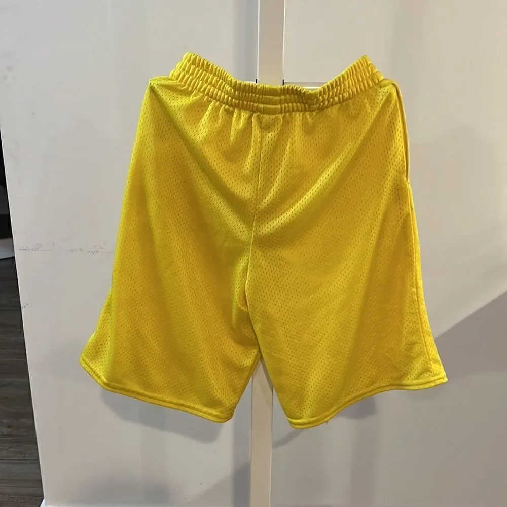 Starter size 10/12 youth boys yellow athletic shorts.